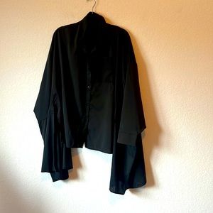 This is a super cool top. I wore it twice with leggings and boots and it’s gorg